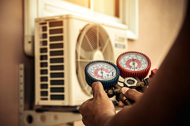 Professional Furnace Repair technician working in Falls City, NE
